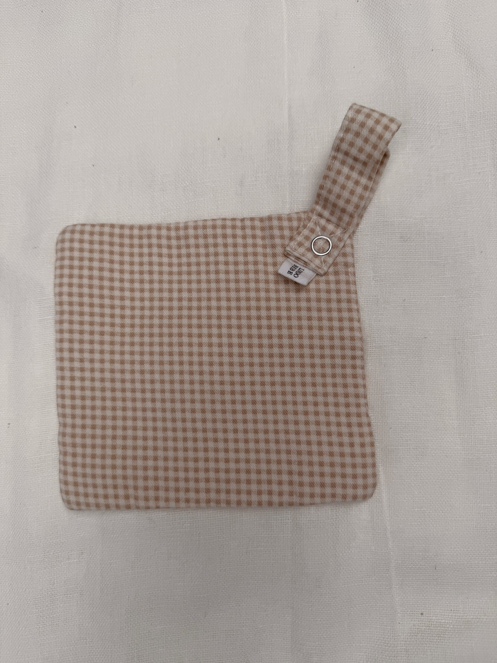 Attache tétine - rouge à motifs